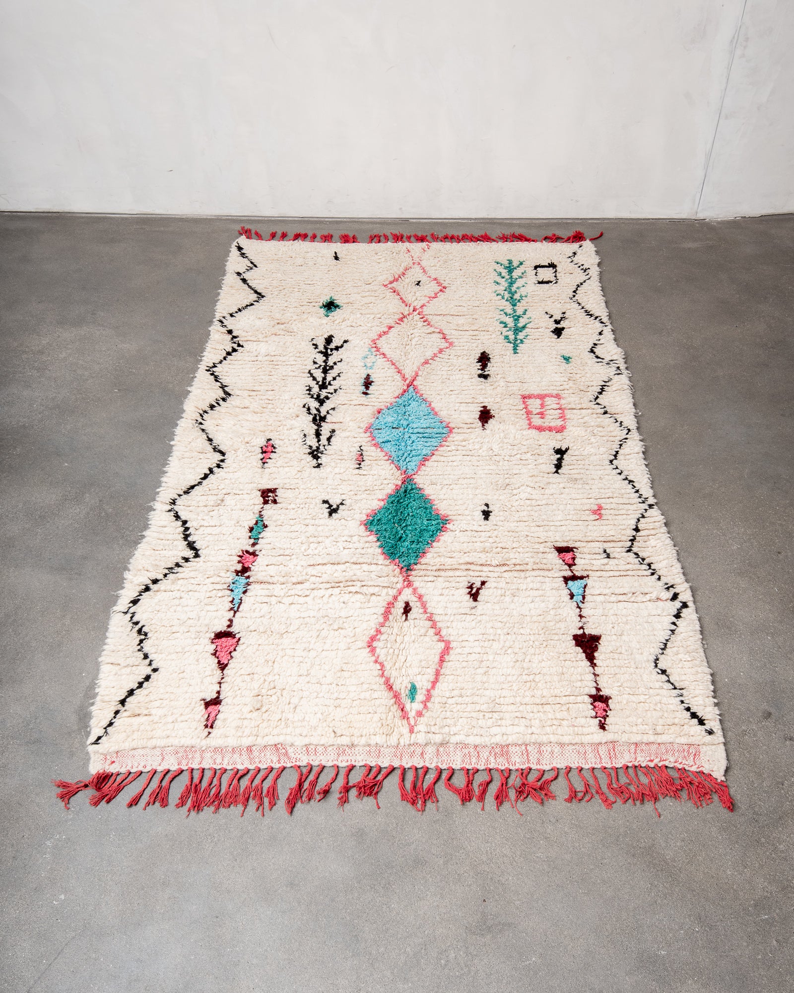 Modern, designer, handcrafted Berber rug from Morocco. Vintage carpet with beautiful colours and patterns and fluffy texture.